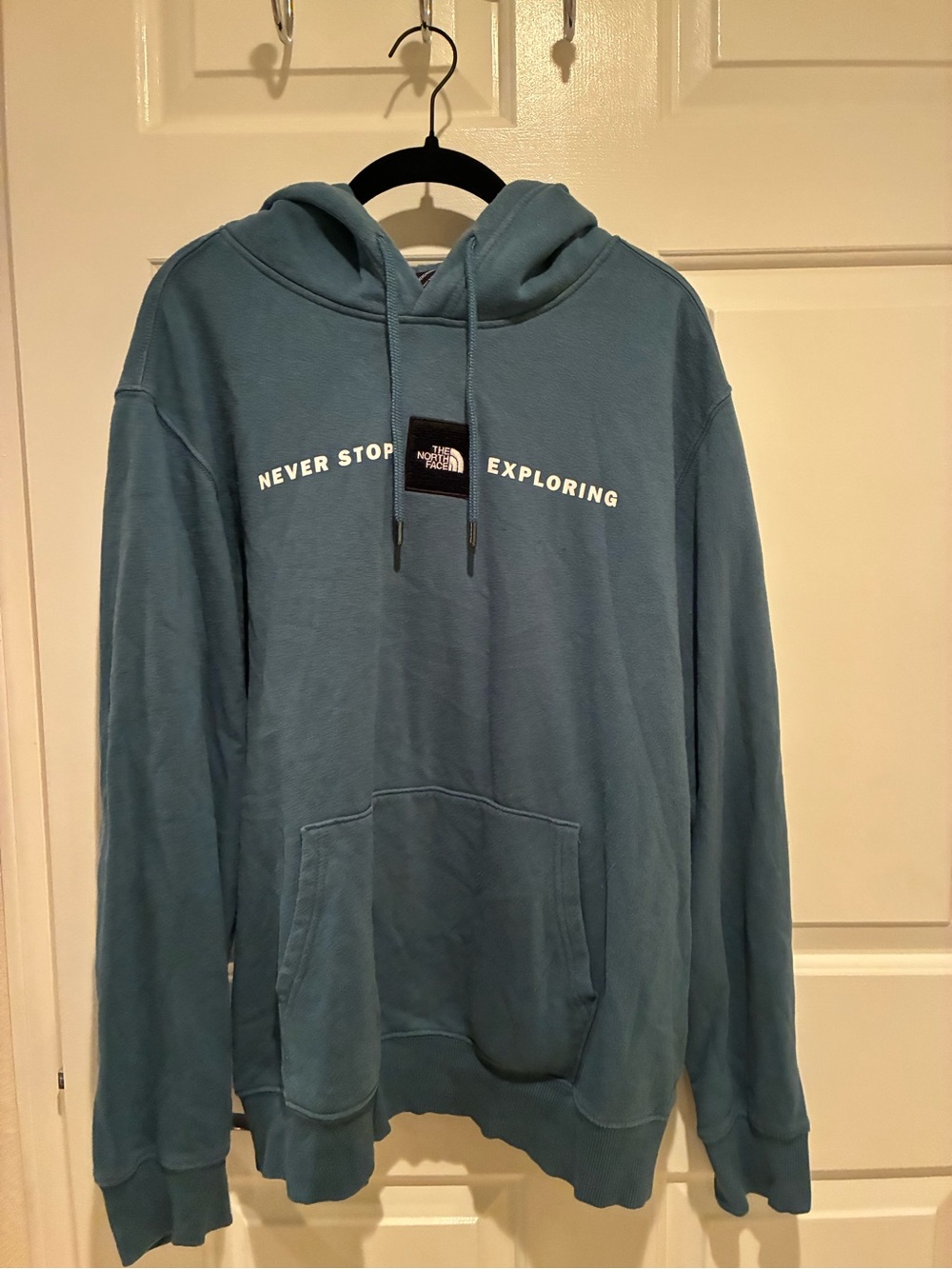 The North Face Teal Blue 'Never Stop Exploring' Pullover Hoodie